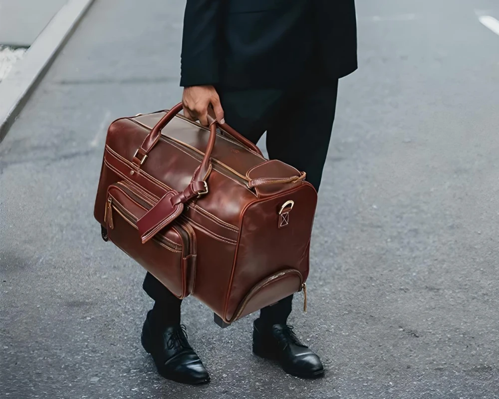 leather rolling carry on